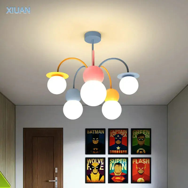 Modern colorful cartoon led chandelier light with pastel pink and blue hub and white bulbs for kids bedroom lighting
