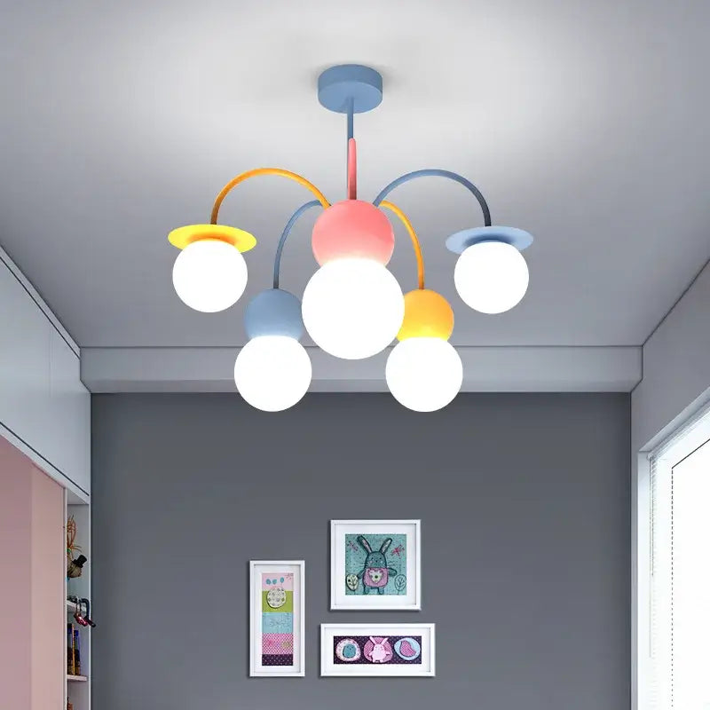 Pastel-colored modern cartoon led chandelier light with spherical bulbs and colorful arched arms for kids bedroom