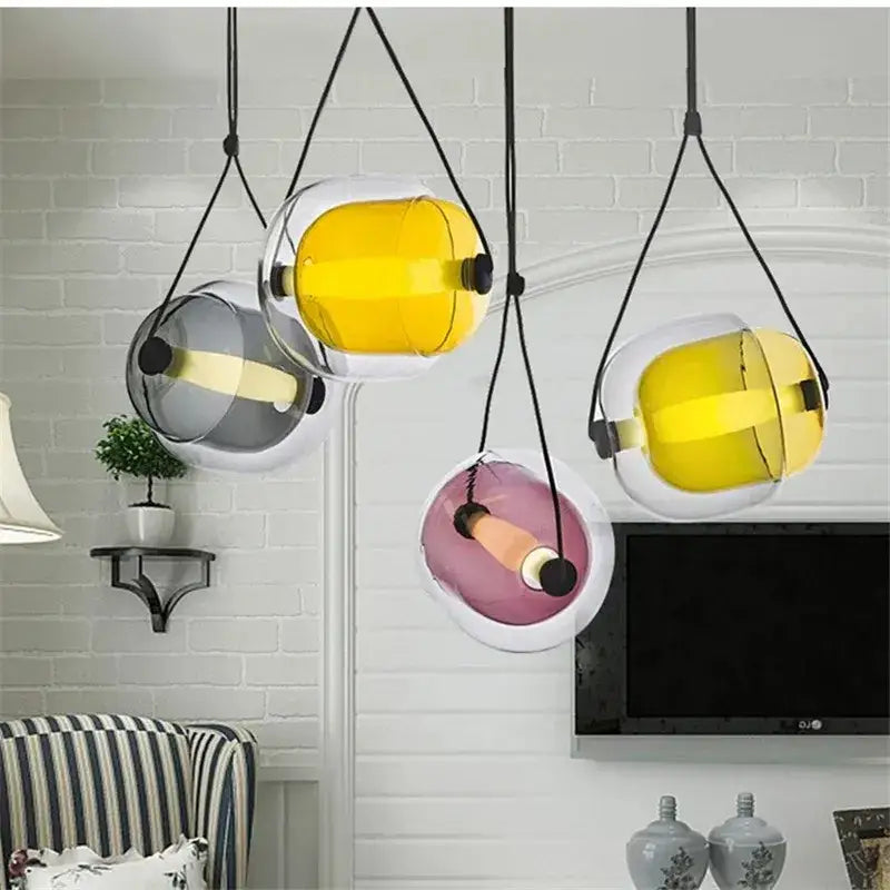 Modern colorful Czech glass capsule pendant light with yellow gray and pink translucent globes for dining room use