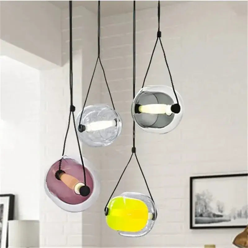 Modern colorful czech glass capsule pendant light with translucent orbs and black cords for dining room pendant light