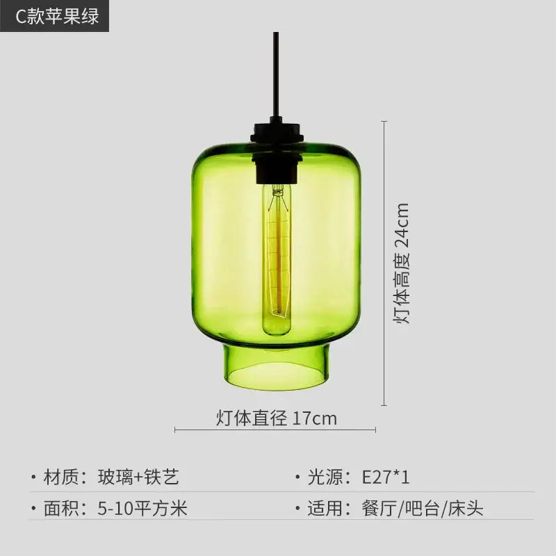 A vibrant green decorbites geometric glass pendant light with black metal fixture and edison bulb for kitchen lighting