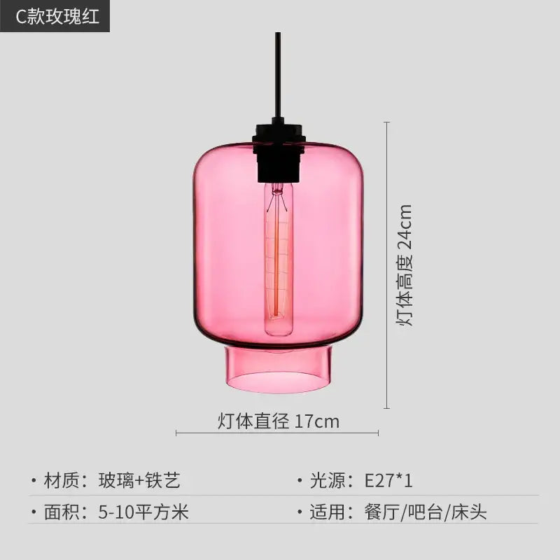 A modern pink translucent glass pendant light with black metal fixture and exposed edison bulb for kitchen decorbites geometric glass