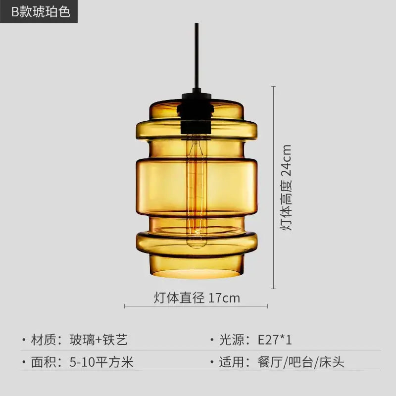 Amber-colored glass pendant light with tiered cylindrical design and Edison bulb for modern kitchen decorbites geometric glass