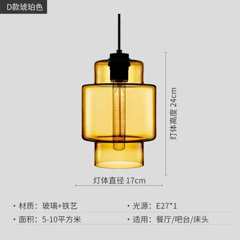 Amber-colored glass pendant light with black metal fixture and exposed filament bulb for modern kitchen lighting decorbites geometric glass