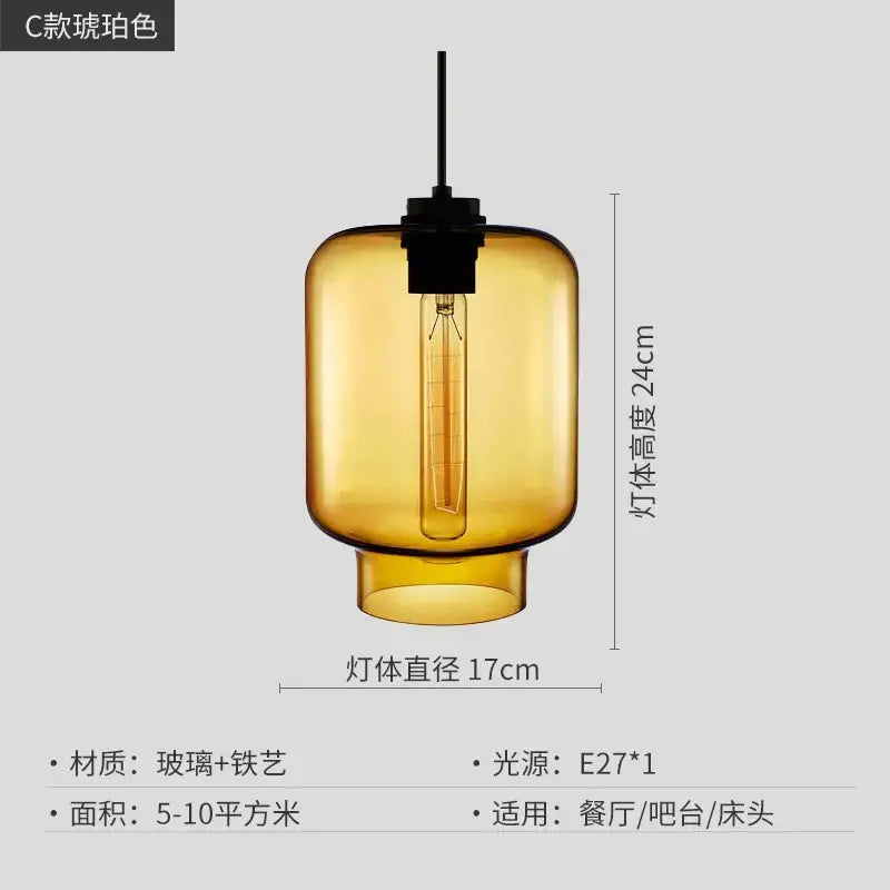 Amber-colored glass pendant light with black metal fixture and exposed edison bulb for kitchen lighting decorbites geometric glass
