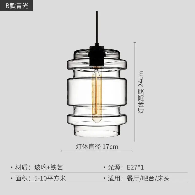 Modern colorful geometric glass pendant light with clear stacked cylindrical tiers and black metal decorbites geometric glass pendant light