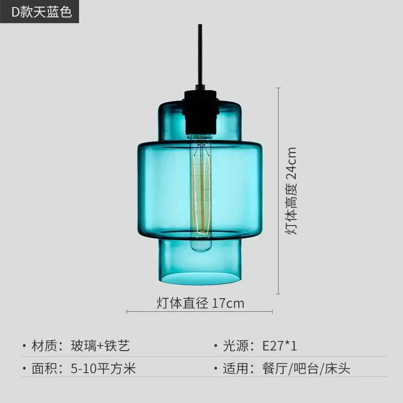 A modern colorful geometric decorbites pendant light with translucent turquoise glass and Edison-style filament bulb