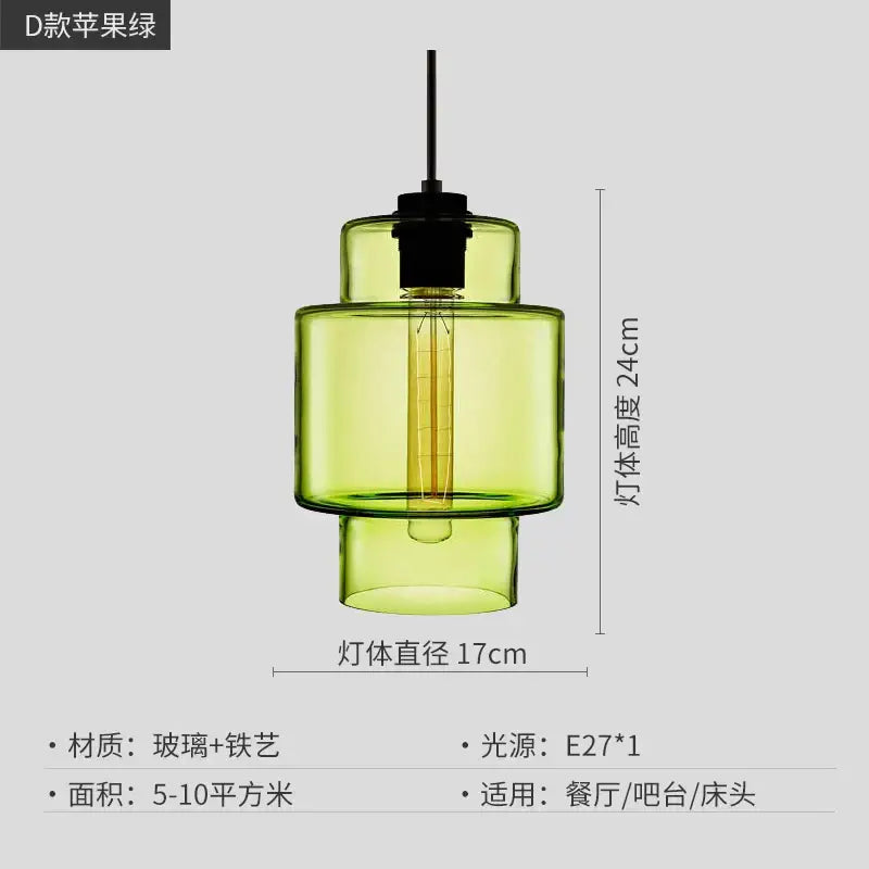 A modern pendant light with tiered translucent green glass and exposed Edison bulb for decorbites geometric glass lighting