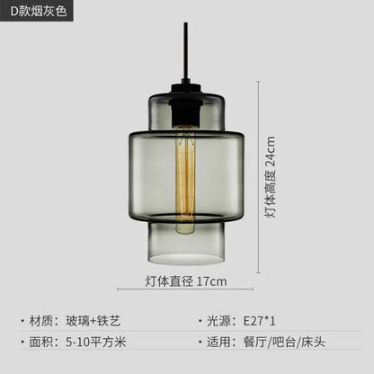 A modern pendant light with tiered smoked gray glass and exposed Edison bulb for decorbites geometric glass lighting