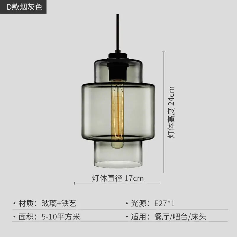 A modern pendant light with tiered smoked gray glass and exposed Edison bulb for decorbites geometric glass lighting