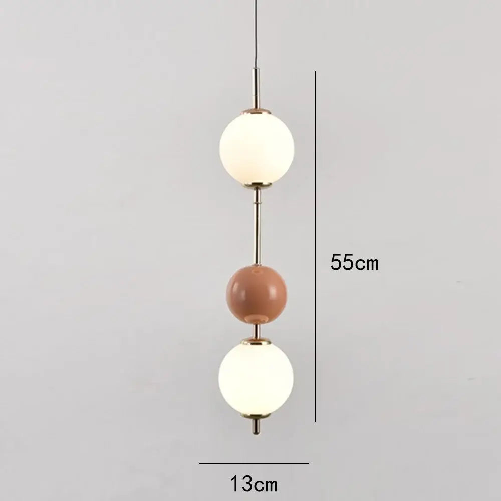 Modern colorful glass ball led pendant light with three spherical glass globes and brass-finished frame for dining room decorbites glass ball