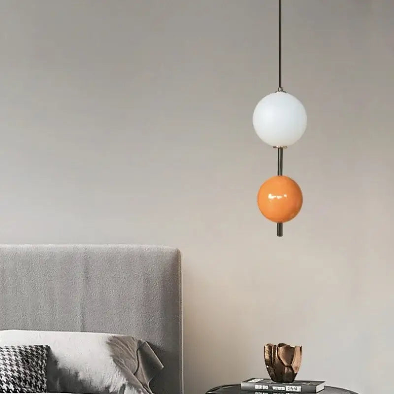 Modern colorful glass ball led pendant light with white and orange spherical globes from decorbites for dining room decor