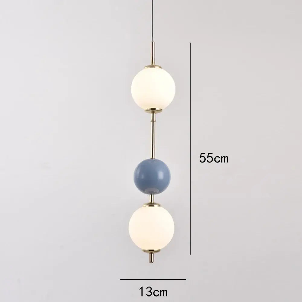 Modern colorful glass ball led pendant light with frosted white and matte blue spheres connected by brass rods for dining room decorbites glass ball pendant light