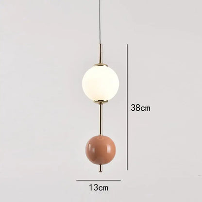 Modern colorful glass ball led pendant light with frosted white glass and matte terracotta ceramic orbs by decorbites