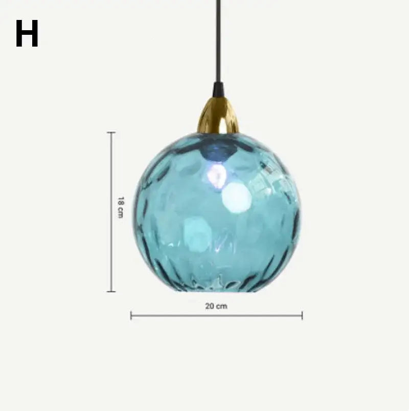 Modern colorful decorbites glass ball lustre pendant lights featuring a spherical blue glass ball with gold fixture