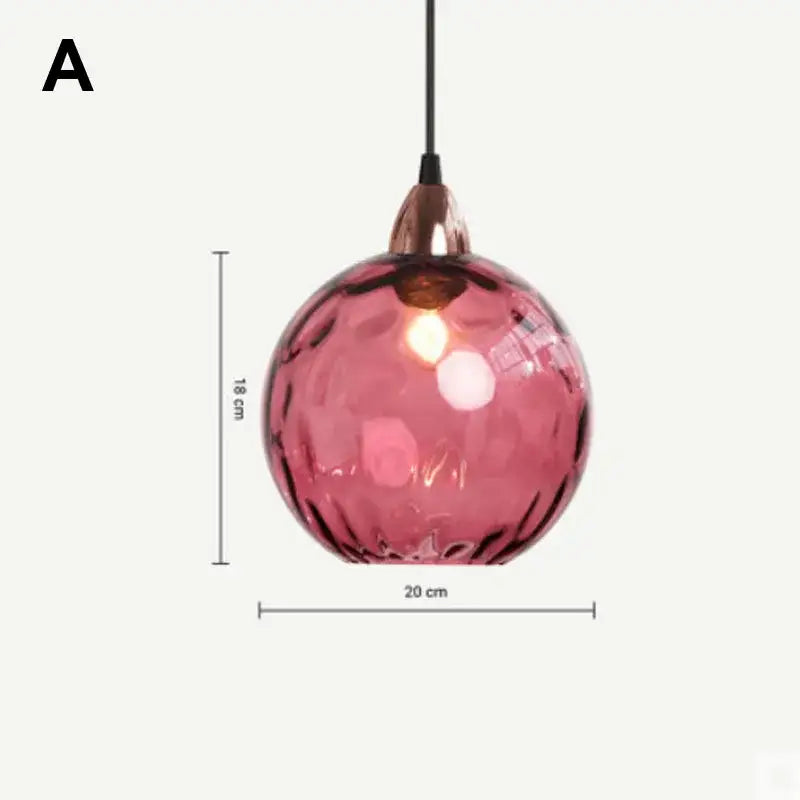 Modern colorful pink spherical glass ball lustre pendant light with copper-toned metal fixture for kitchens decorbites pendant lights