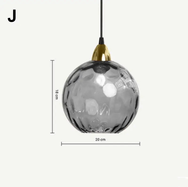 A sleek 18 cm tall pendant light with textured gray glass ball and polished gold fixture for modern kitchens decorbites glass ball lustre