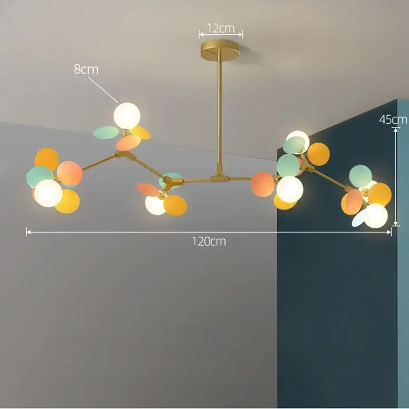 A modern gold-toned decorbites branch chandelier with pastel glass orbs and leaves for living room decor