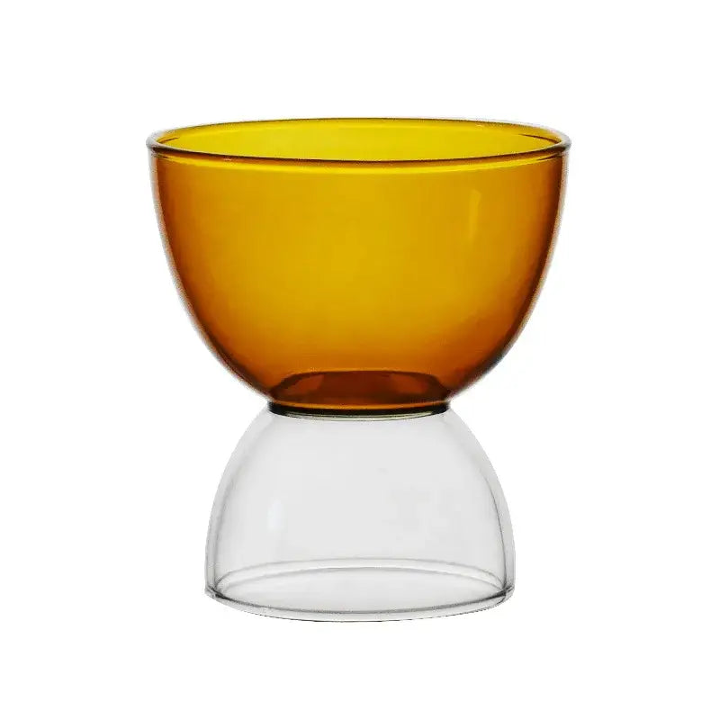 A modern amber glass dessert ice cream cup with a clear glass base featuring a minimalist design