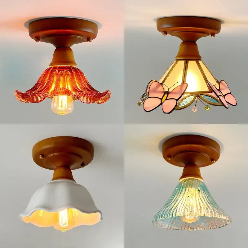Four decorative flush-mount ceiling lamps with wooden bases and decorbites colorful glass led shades in orange pink white and blue