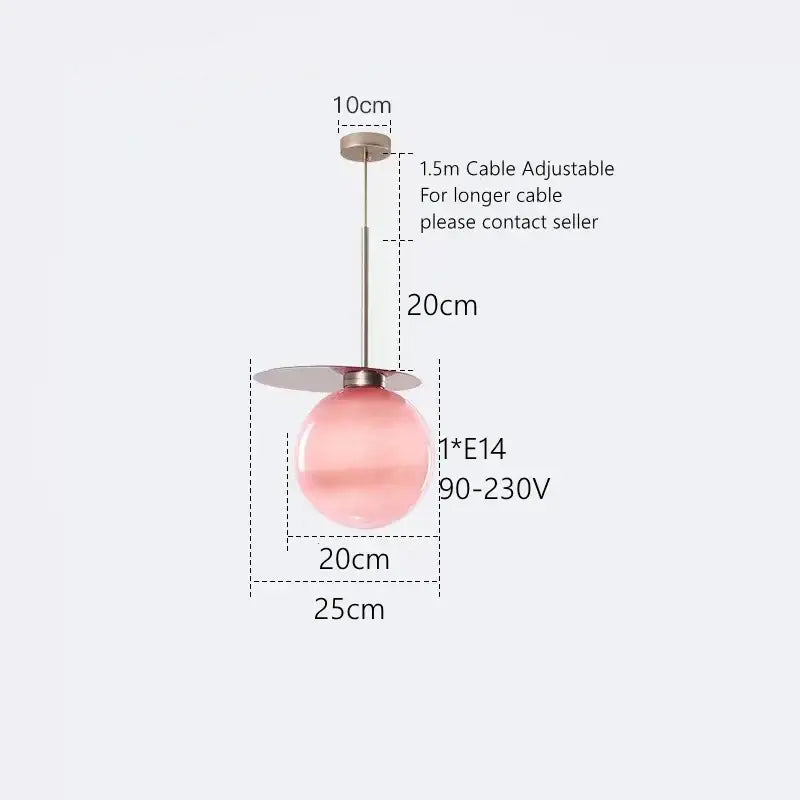 A soft pink translucent glass globe pendant light with sleek metallic stem for modern colorful glass metal decorbites dining room
