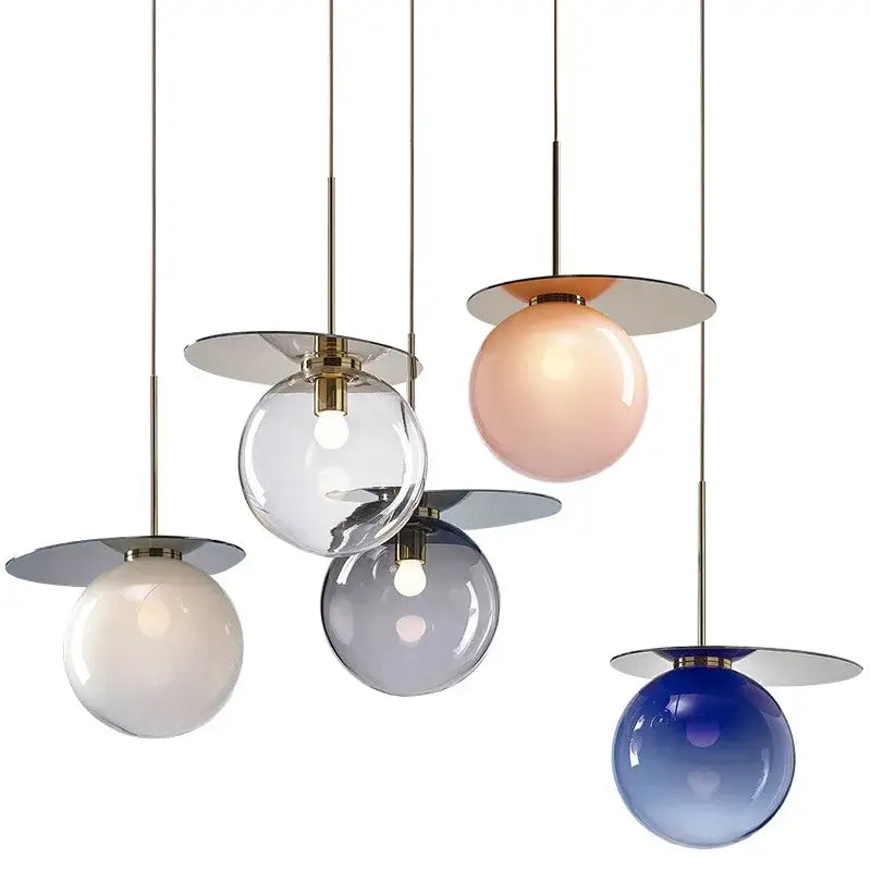 Modern colorful glass metal pendant lamp with frosted pastel glass shades and metallic accents for dining room decorbites colorful glass