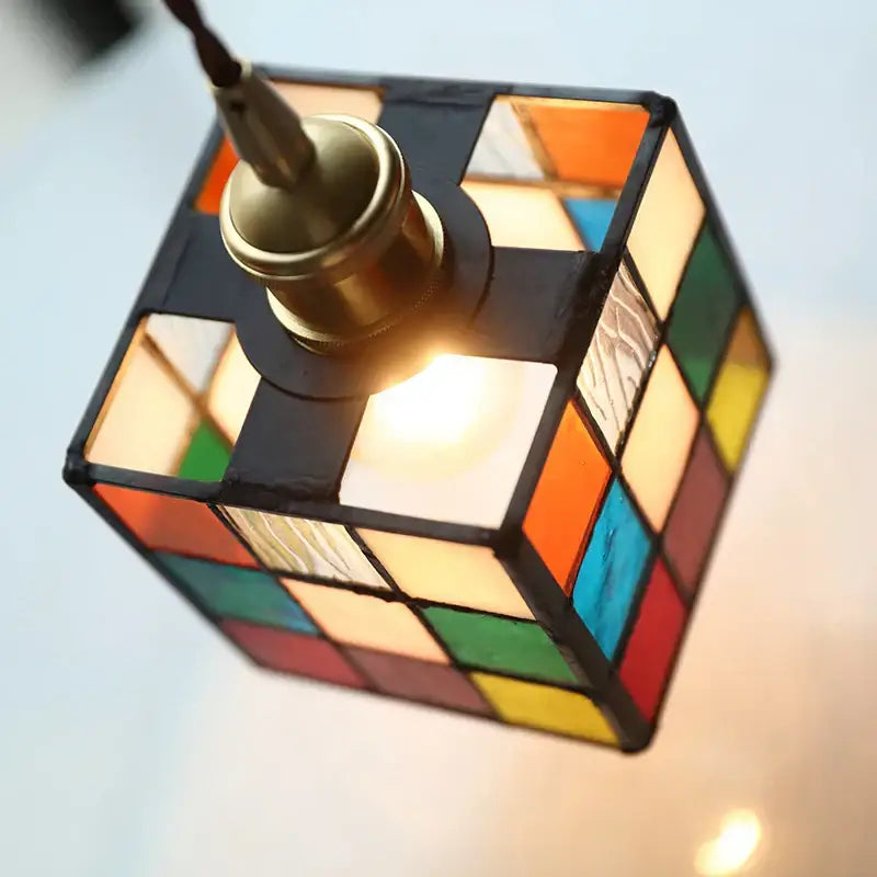 Modern colorful led glass cube pendant light with brass fixture showcasing decorbites colorful led design for kitchen decor