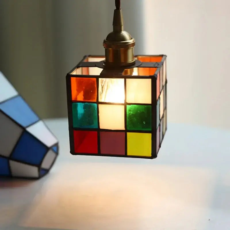Colorful led glass cube pendant light with brass fixture for modern kitchen decor featuring decorbites colorful led design