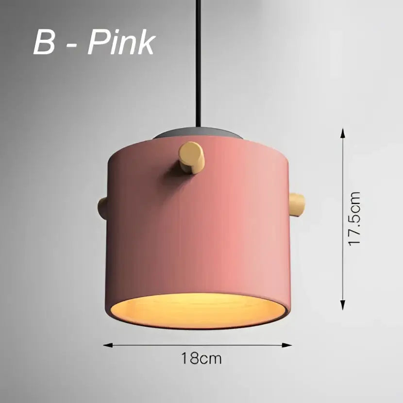 Modern colorful led pendant lights featuring pink cylindrical pendant lights with wooden accents and warm yellow glow