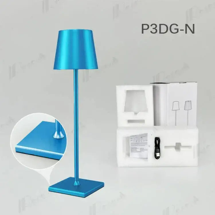 A sleek modern blue metallic table lamp with cylindrical shade decorbites crystal led rechargeable for dining room decor