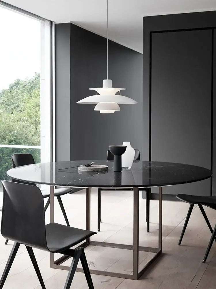White layered pendant light with sleek modern design hanging above dining table decorbites colorful umbrella led