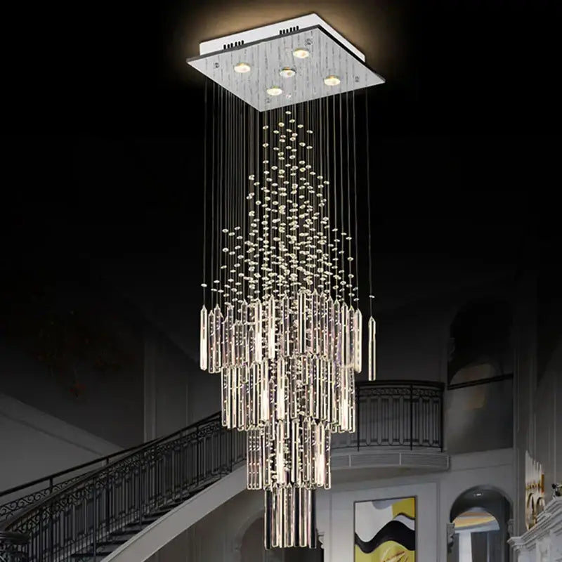 Modern columnar crystal chandelier with sleek chrome finish and cascading clear crystal rods for white living room decorbites columnar