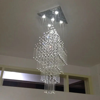 Modern columnar crystal chandelier with sleek triangular metal fixture and cascading clear glass beads for white living room decorbites columnar crystal design