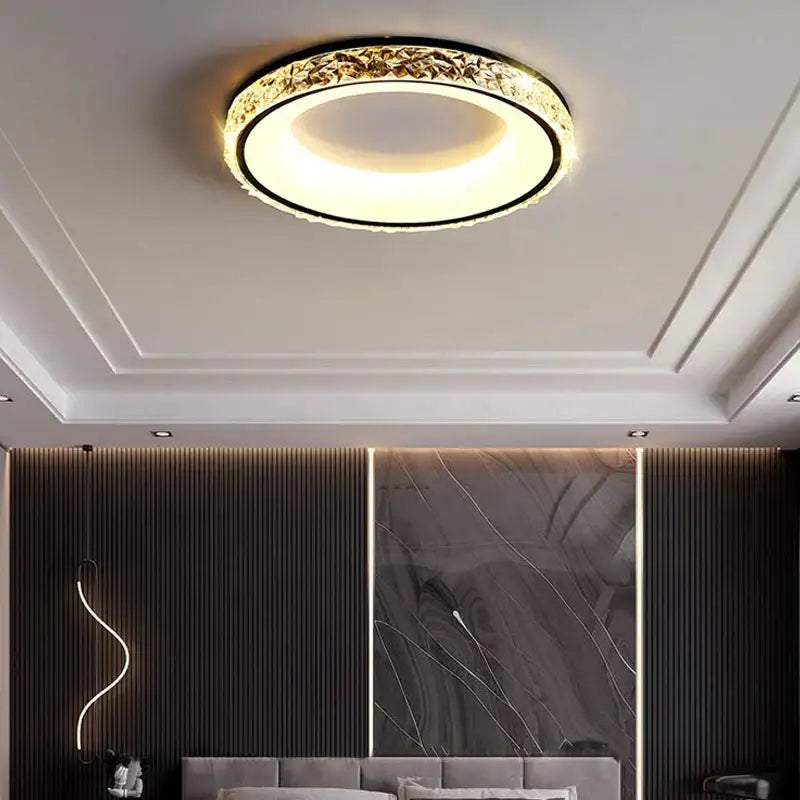 Modern concave round crystal ceiling light with gold-toned textured ring and warm white center for living room decorbites ceiling light
