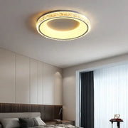 Modern concave round ceiling light with warm glow featuring textured crystal outer ring and sleek metallic frame for living room decorbites concave round