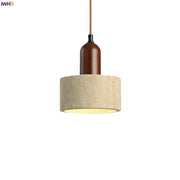 Modern pendant light with cylindrical concrete shade and dark brown wooden top featuring decorbites led yellow travertine
