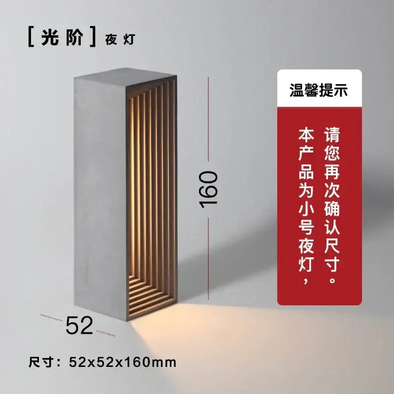 Modern concrete stone table lamp with vertical wood slats emitting warm ambient glow for bedroom decorbites concrete stone
