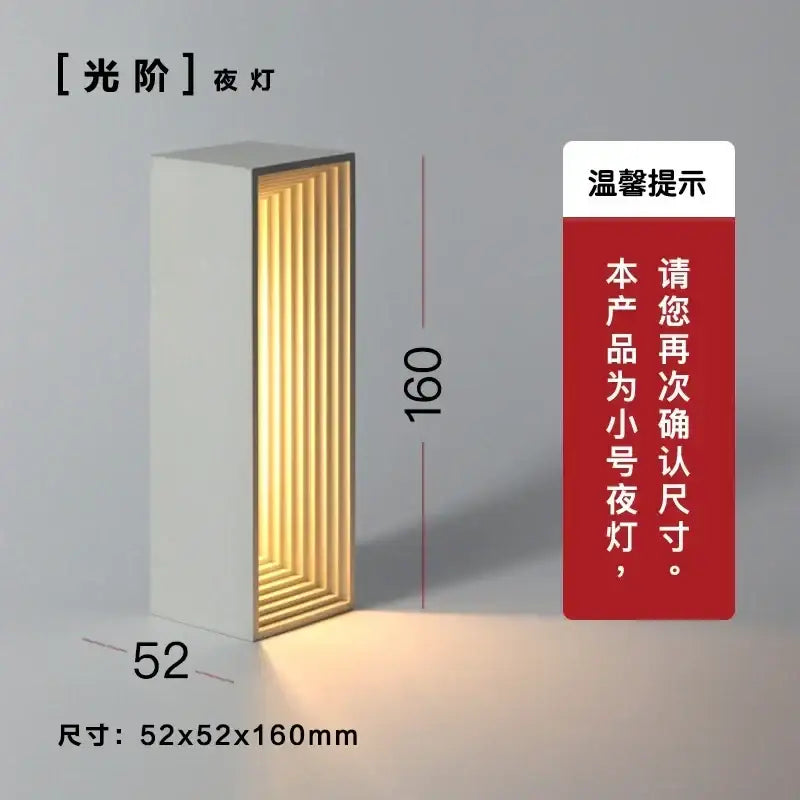 Modern concrete stone table lamp bedroom wood slat touch light with sleek white rectangular design and warm golden glow interior