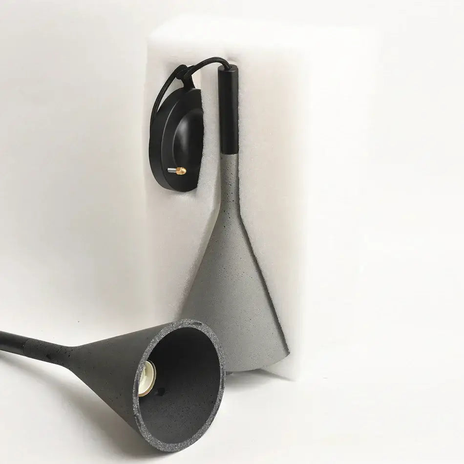 Black concrete conical pendant light with matte finish and integrated wall switch for kitchen and dining room decorbites concrete pendant