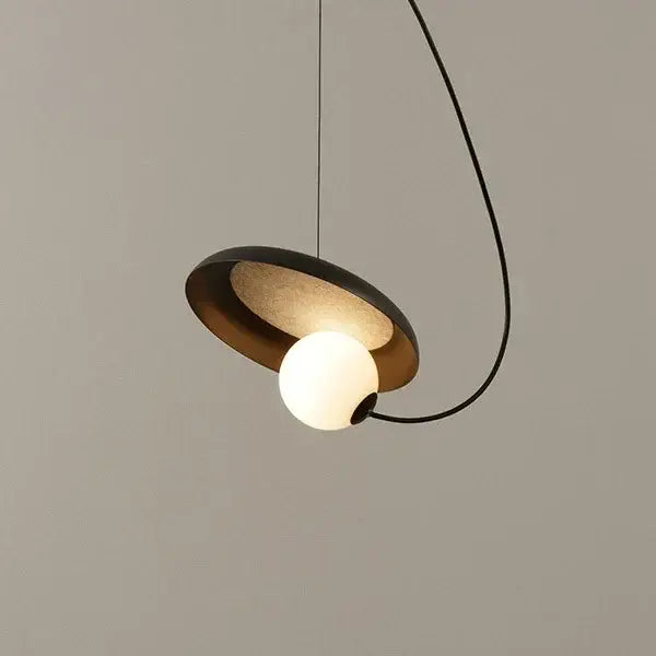 Modern pendant light with sleek black metal frame warm-toned frosted glass globe decorbites grid color led design