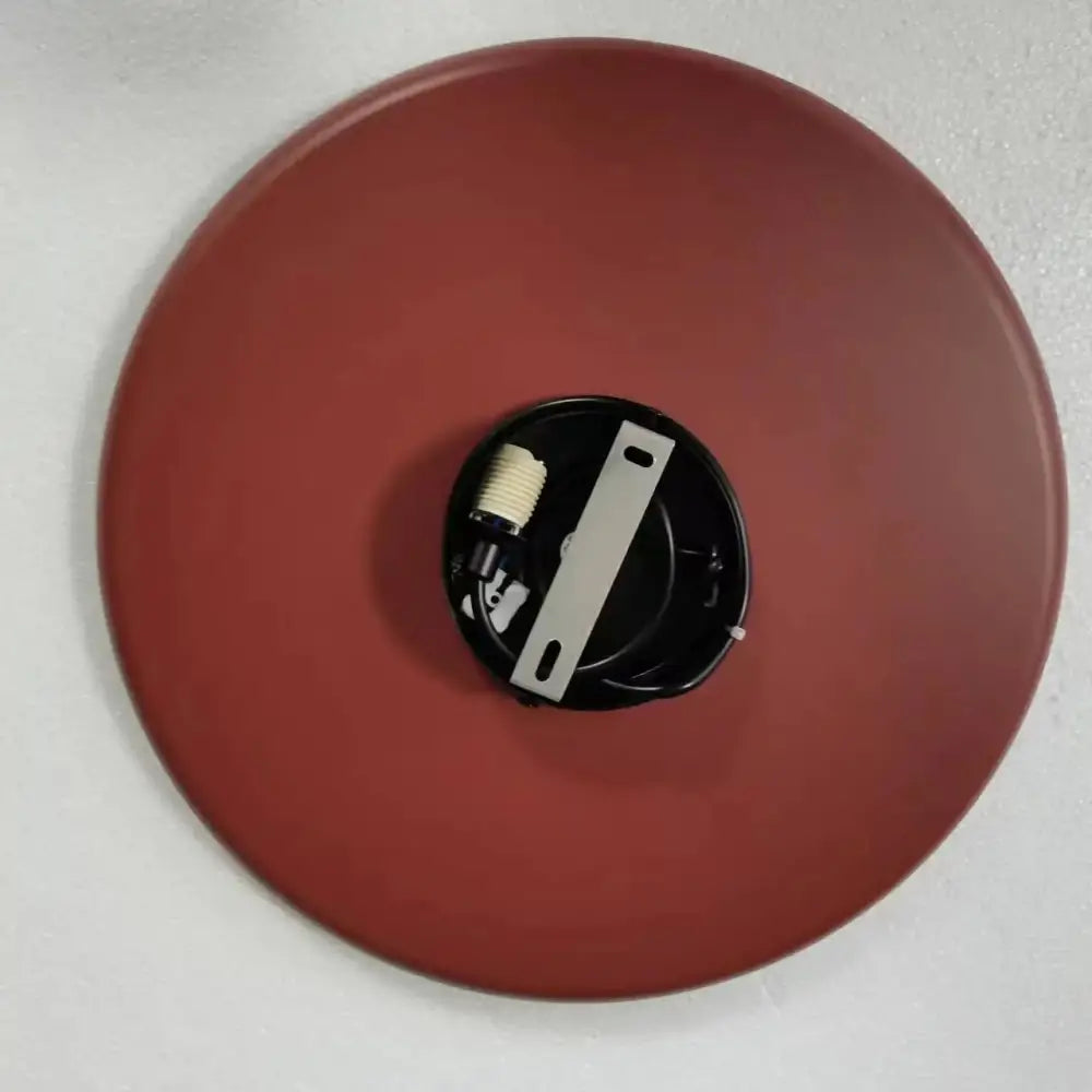 Modern copper and black grid led pendant light with matte red circular fixture and central black mounting bracket for dining room decorbites grid led pendant