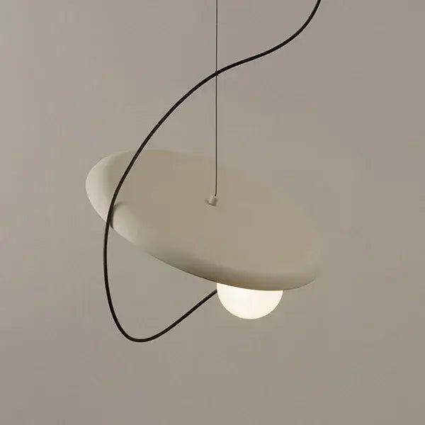 Minimalist white pendant light with sleek curved black cable and oval diffuser for modern copper and black grid led decorbites grid led pendant