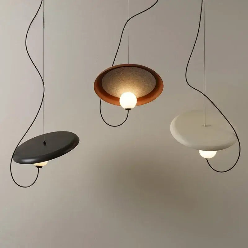 Three modern pendant lights with copper and black grid led design in matte black, warm brown, and off-white for dining room decorbites grid led
