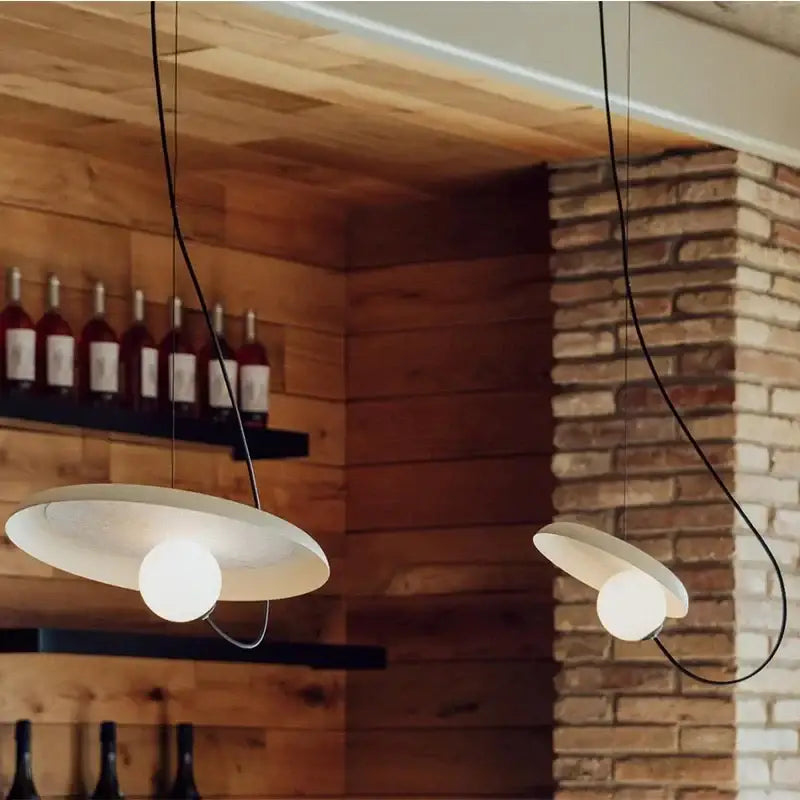 Modern copper and black grid led pendant light with sleek white pendant lights and soft glowing bulbs for dining room decorbites grid led