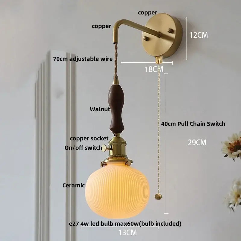 Modern copper and off-white ribbed wall light fixture with brass copper finish and walnut wooden handle for bedroom use