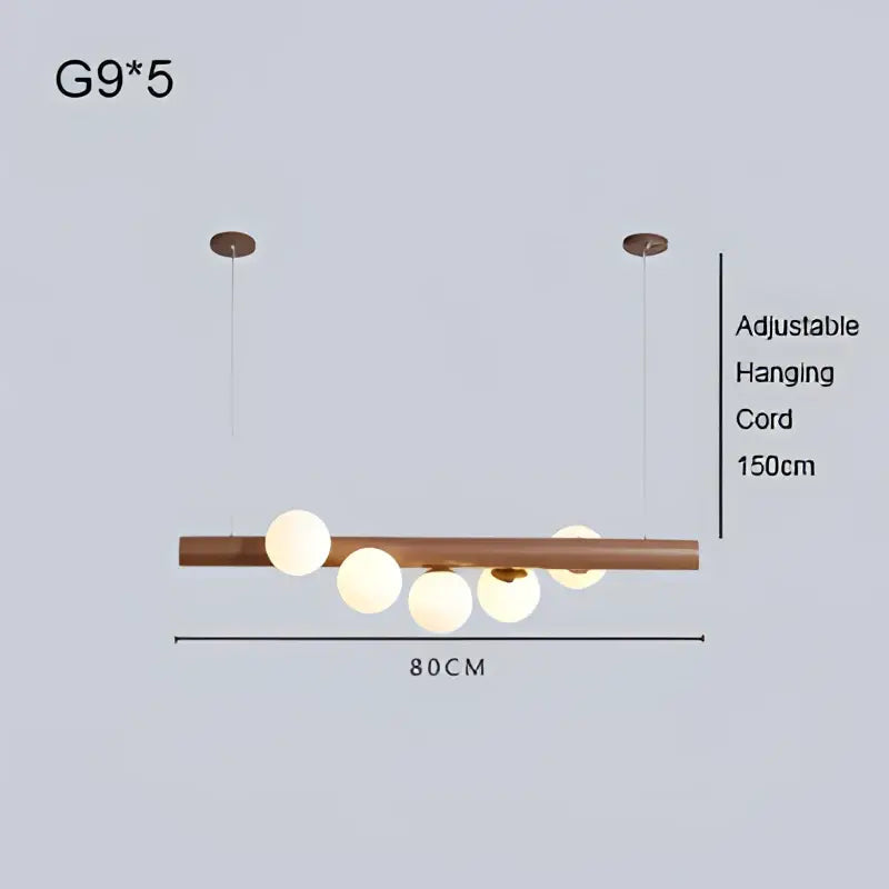 Modern minimalist pendant light with warm-toned decorbites burly wood walnut bar and five asymmetrical g9 bulbs