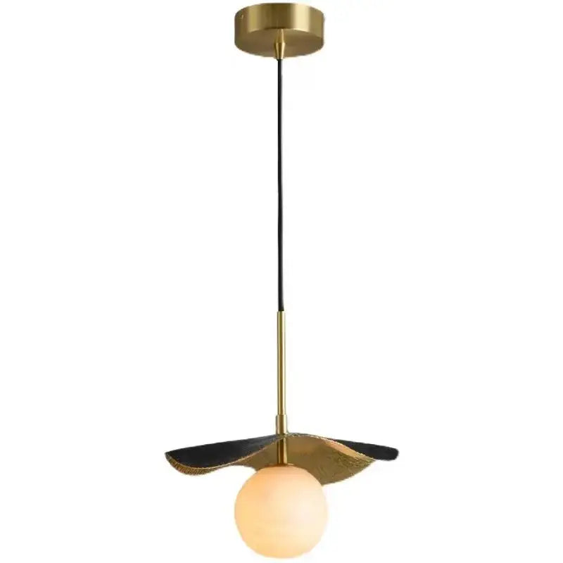 Modern copper bedside chandelier with brass finish, leaf accents, opal glass globe bulb from decorbites copper bedside collection