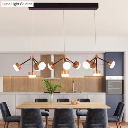 DecorBites™ modern ceiling island pendant light with copper and black finish, spherical glass shades, and bulb base
