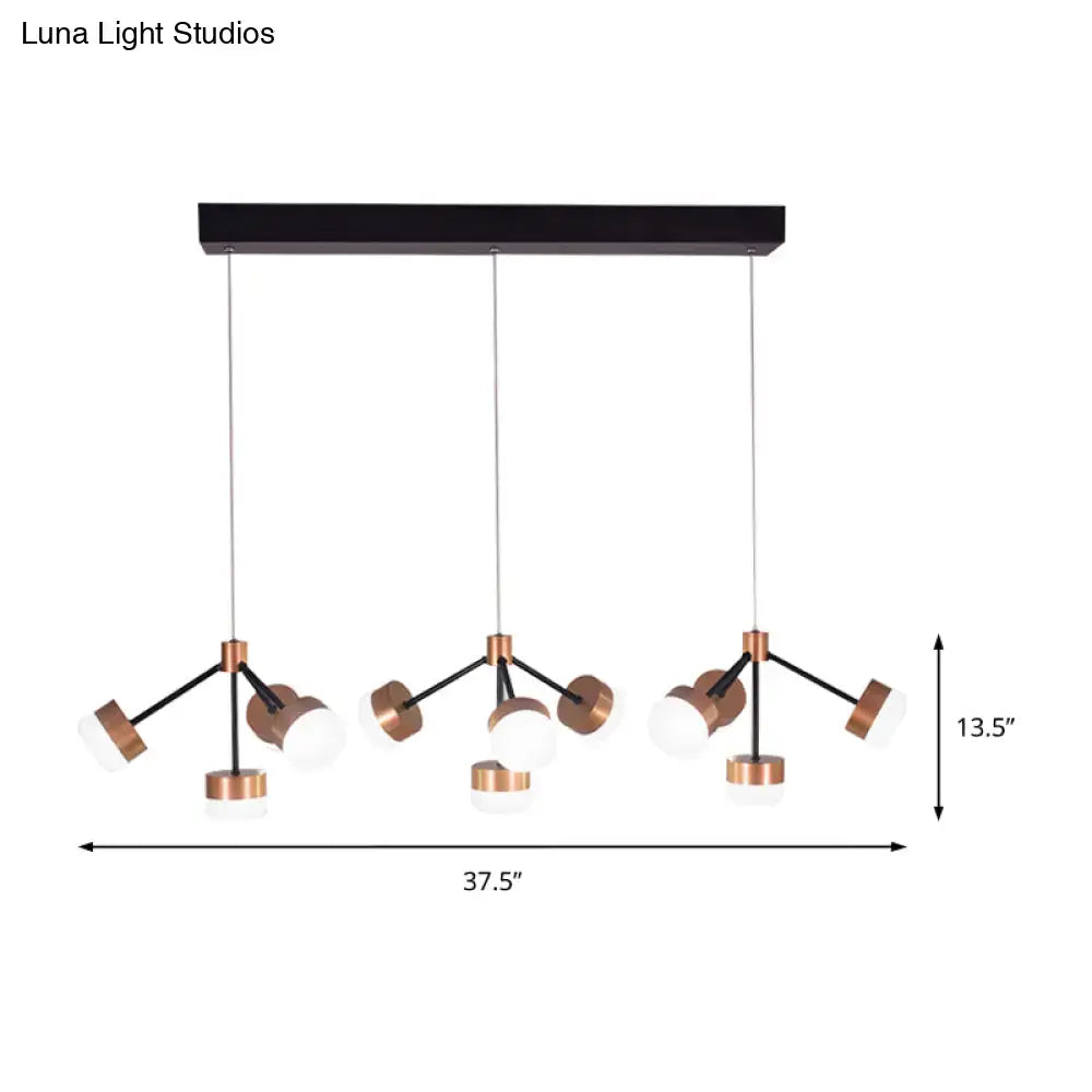 Modern copper and black metal ceiling island pendant light with three frosted glass globes and bulb base accents