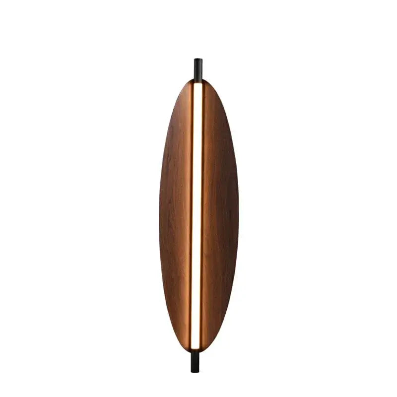 A sleek oval wall sconce with warm brown metal leaf finish and central led light strip for modern decorbites bedroom lighting